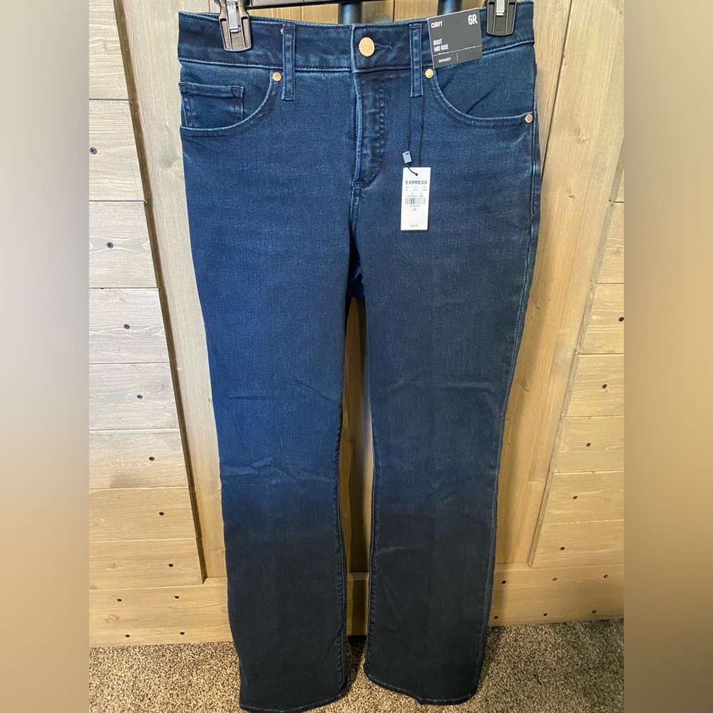 Express woman’s curvy boot mid rise super soft stretch jeans 6R NWT